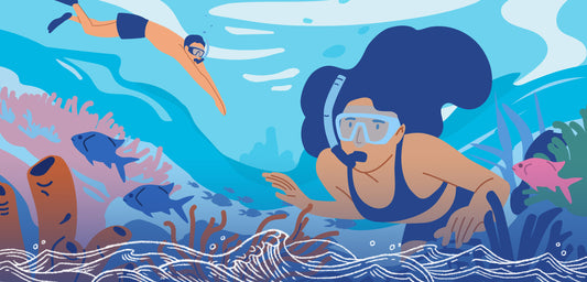 A design of two snorkelers exploring a coral reef